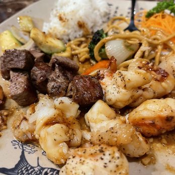 Sakura - Combination Steak, Scallops, Lobster Tail and Shrimp Along with rice and noodles - Sushi Bars Near Me - Kapolei, Hawaii Sakura - Combination Steak, Scallops, Lobster Tail and Shrimp Along with rice and noodles - Sushi Bars Near Me - Kapolei, Hawaii