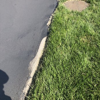 Ram Asphalt - a shadow of a man on a skateboard - General Contractors Near Me - St. Louis, Missouri