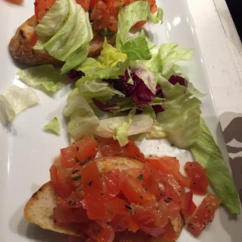 Rossopomodoro - Sad bruschetta appetizer. Just two little crostinis. Sad face. - Napoletana Near Me - Venezia, VE Rossopomodoro - Sad bruschetta appetizer. Just two little crostinis. Sad face. - Napoletana Near Me - Venezia, VE