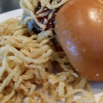 Not Your Average Joe's - Waltham - Burger with a messy pile of cold, under seasoned onion strings - New American Near Me - Waltham, Massachusetts Not Your Average Joe's - Waltham - Burger with a messy pile of cold, under seasoned onion strings - New American Near Me - Waltham, Massachusetts