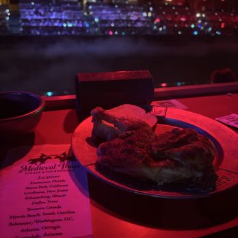 Medieval Times Dinner & Tournament - Another Angle of the plate chicken, corn garlic bread and potato wedge. - Dinner Theater Near Me - Buena Park, California Medieval Times Dinner & Tournament - Another Angle of the plate chicken, corn garlic bread and potato wedge. - Dinner Theater Near Me - Buena Park, California