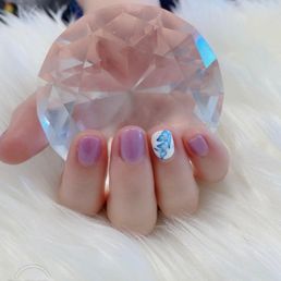 My right hand with gel polish and sticker.