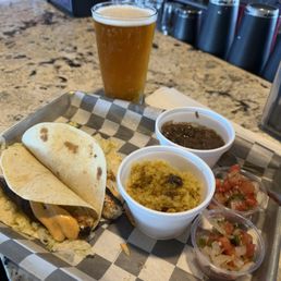 Mahi mahi tacos, Cuban black beans, rice and pico.