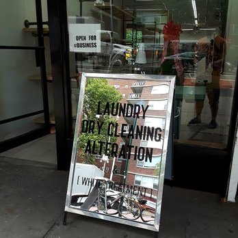 Laundry Project 23 - Reflection on 23rd street. - Laundry Services Near Me - New York, New York