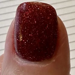 Chipped top coat due to gel light.