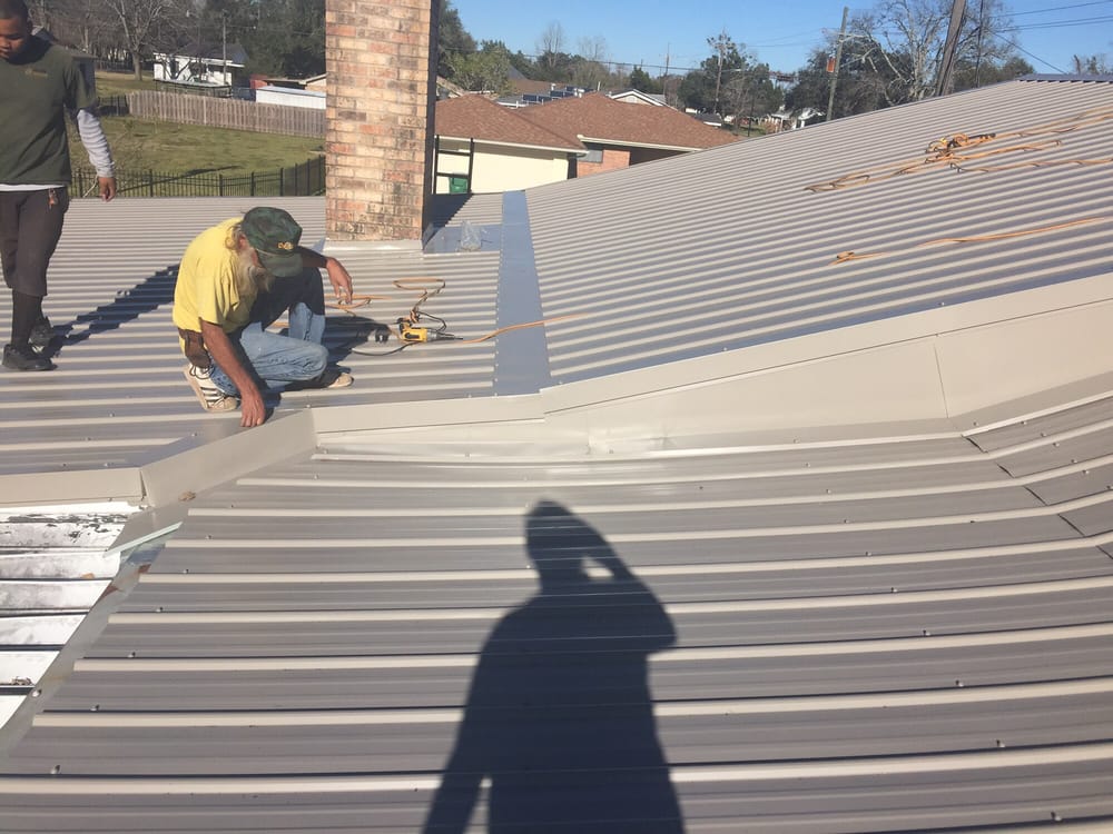 Slide of Ford Roofing Service