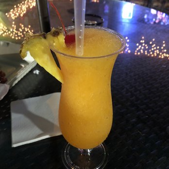 Caribbean Resort Tiki Bar - Mango daiquiri - Tiki Bars Near Me - Hollywood, Florida Caribbean Resort Tiki Bar - Mango daiquiri - Tiki Bars Near Me - Hollywood, Florida