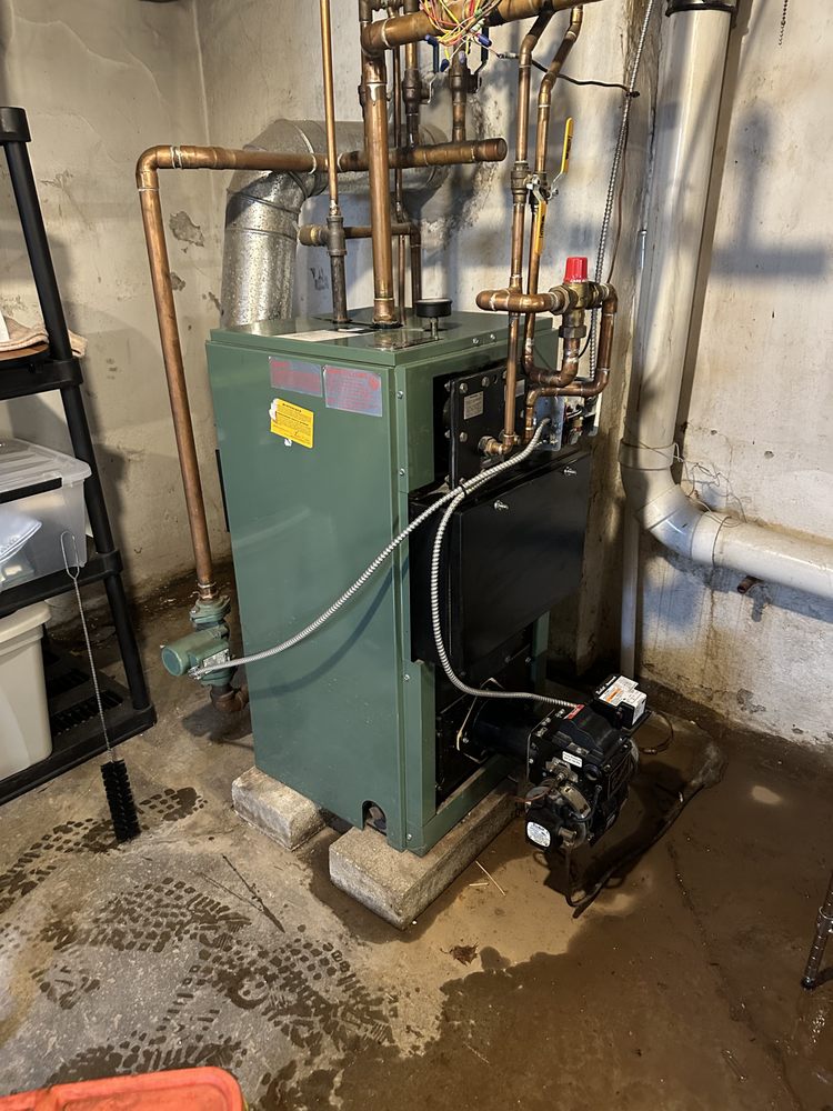 Slide of JL plumbing and heating