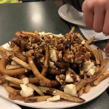Elgin Street Diner - The onion ring and fries poutine - Diners Near Me - Ottawa, Ontario Elgin Street Diner - The onion ring and fries poutine - Diners Near Me - Ottawa, Ontario