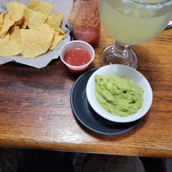 El Toro Mexican Restaurant - Warm chips, salsa, guacamole, and jumbo margarita.