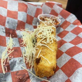 Cluckers - Versailles - a cheesy bread roll with cheese - Burgers Near Me - Versailles, Kentucky