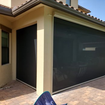 Harrison Awnings - SunPro Motorized Screens in Beige Frames with Solar Screen material in Parkland FL - Awnings Near Me Harrison Awnings - SunPro Motorized Screens in Beige Frames with Solar Screen material in Parkland FL - Awnings Near Me