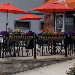 The Flying Cow - Outdoor sidewalk view of shop