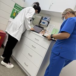 Sergio Gomez, MD - The Staff taking down vitals today