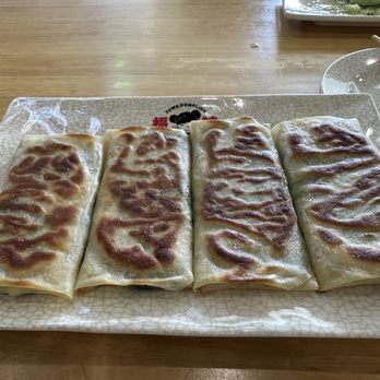 Fuwa Dumpling 福娃餃子 - Chive pancake looks good in pictures but is quite bland in person. Requires chili oil (which here is smoky, not hot.) - Chinese Near Me - San Francisco, California Fuwa Dumpling 福娃餃子 - Chive pancake looks good in pictures but is quite bland in person. Requires chili oil (which here is smoky, not hot.) - Chinese Near Me - San Francisco, California