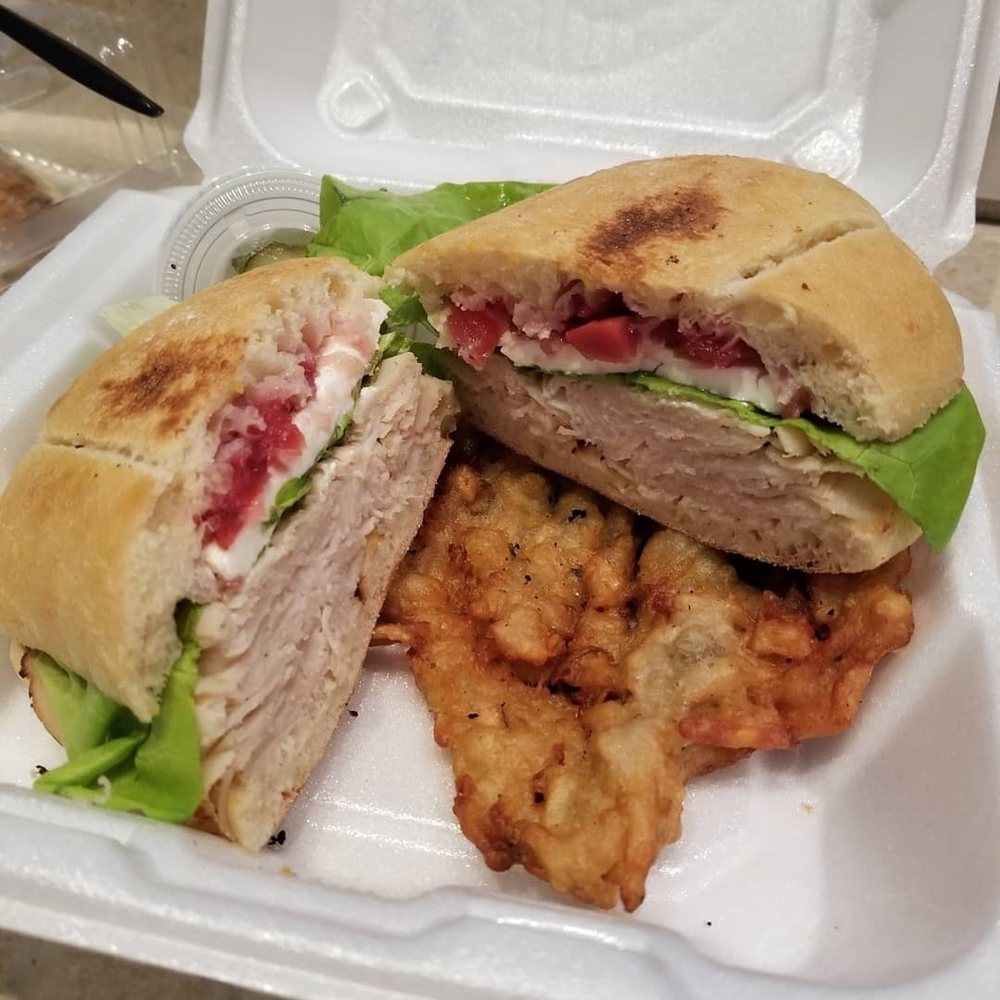 Izzys - Thanksgiving on a roll with a potato cake - Sandwiches Near Me - Florence, Kentucky Izzys - Thanksgiving on a roll with a potato cake - Sandwiches Near Me - Florence, Kentucky