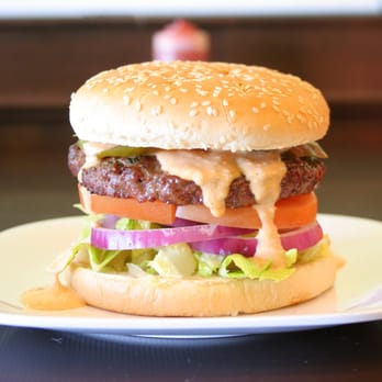 Holy Schnitzel - a hamburger on a plate - Kosher Near Me - Cedarhurst, New York Holy Schnitzel - a hamburger on a plate - Kosher Near Me - Cedarhurst, New York