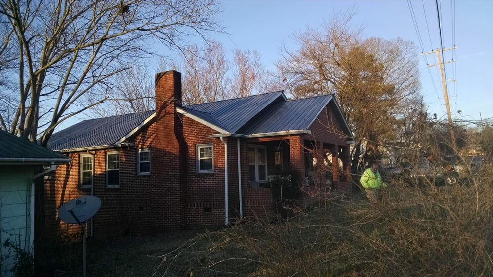 Slide of JC Metal Roofing