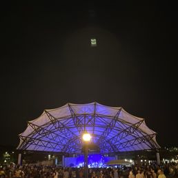 Crowd, lawn, and covered stage / seats. Crowd, lawn, and covered stage / seats.