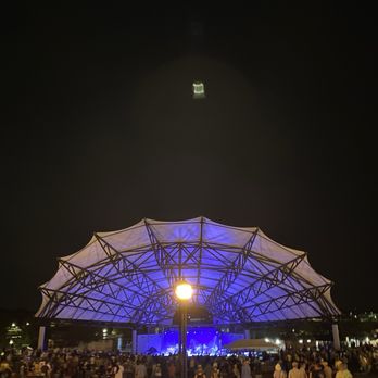 Apopka Amphitheater - Crowd, lawn, and covered stage / seats. - Music Venues Near Me - Apopka, Florida Apopka Amphitheater - Crowd, lawn, and covered stage / seats. - Music Venues Near Me - Apopka, Florida