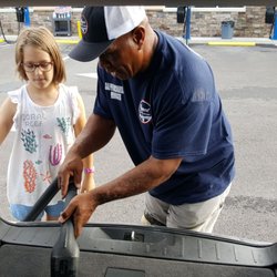 Algood Xpress Wash - General manager, Ralph, teaching my niece about vacuuming. Great customer service!