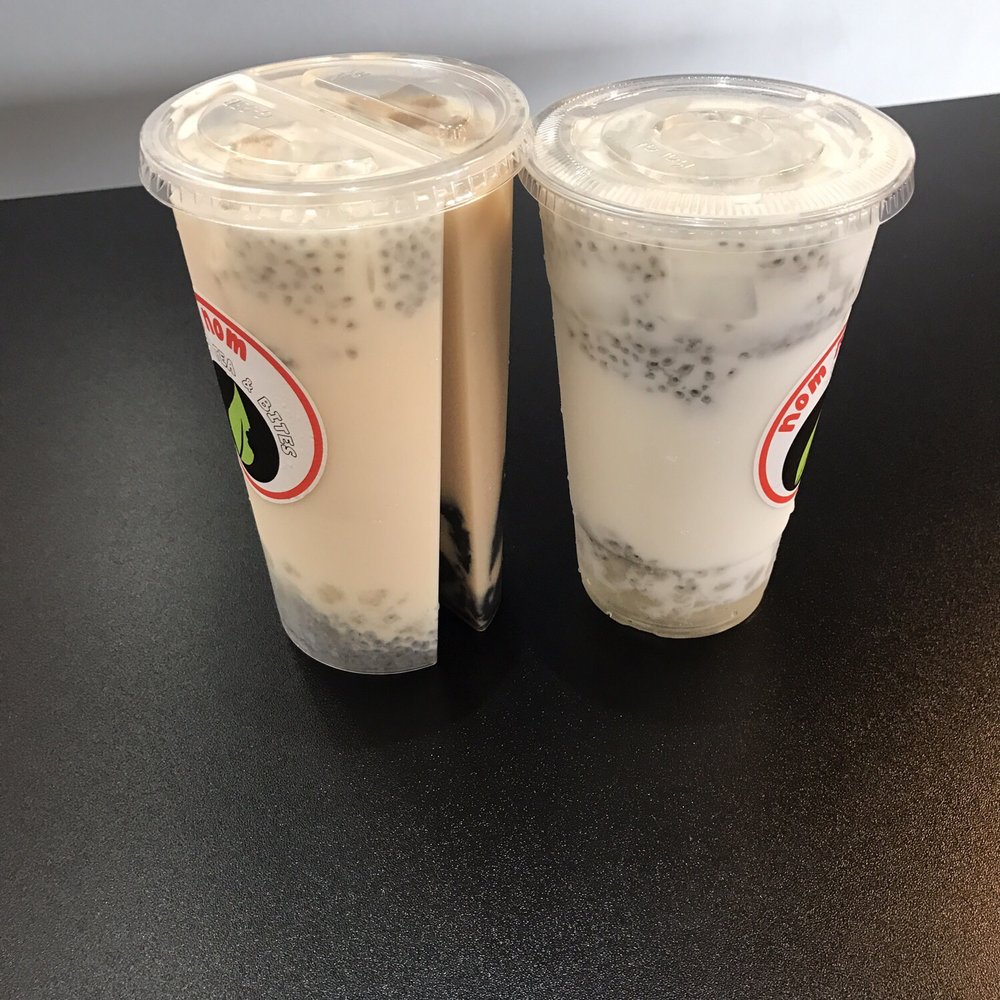 Nom Nom Tea & Bites - hokkaido milk tea with basil seed & crystal boba + oolong milk tea w/ grass jelly, coconut milk tea w/ basil see &crystal boba - Bubble Tea Near Me - Duluth, Georgia Nom Nom Tea & Bites - hokkaido milk tea with basil seed & crystal boba + oolong milk tea w/ grass jelly, coconut milk tea w/ basil see &crystal boba - Bubble Tea Near Me - Duluth, Georgia