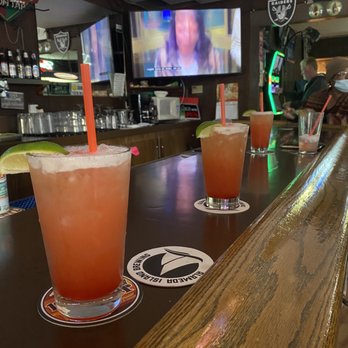 Wally's Corner - a row of drinks on a bar - Bars Near Me - Alameda, California