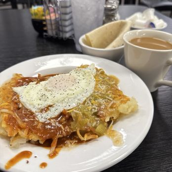 Weck's - Christmas time! - A breakfast meal featuring a fried egg on a plate with hash browns and vegetables, accompanied by a cup of coffee and tortillas. - Breakfast & Brunch Near Me - Las Cruces, New Mexico
