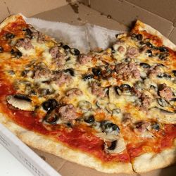 Greenwich Pizzeria - Medium cheese pizza with mushrooms and black olives.