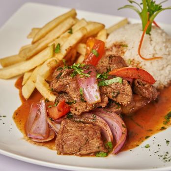 Inka Fé - a plate of meat and french fries - Desserts Near Me - Great Neck, New York Inka Fé - a plate of meat and french fries - Desserts Near Me - Great Neck, New York
