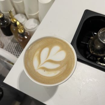 Solo Coffee Cart - latte with a leaf design - Coffee & Tea Near Me Solo Coffee Cart - latte with a leaf design - Coffee & Tea Near Me