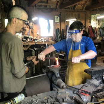 Forge A Memory - Detailing the handle. - Metal Fabricators Near Me - Mackinac Island, Michigan Forge A Memory - Detailing the handle. - Metal Fabricators Near Me - Mackinac Island, Michigan