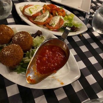 Bistro Aldilaitalian - plates of food on a table - Italian Near Me - East Rutherford, New Jersey Bistro Aldilaitalian - plates of food on a table - Italian Near Me - East Rutherford, New Jersey