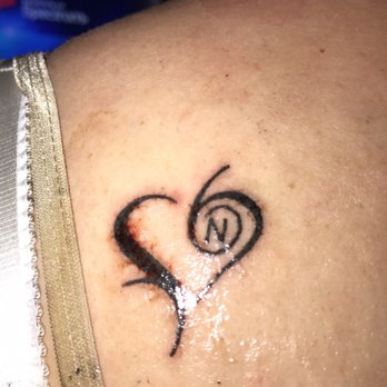 Treasure Island Tattoo - Hers - Tattoo Near Me - Treasure Island, Florida Treasure Island Tattoo - Hers - Tattoo Near Me - Treasure Island, Florida