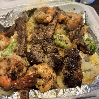 OMG Baked Potatoes - Steak and Shrimp Potato - Soul Food Near Me - Houston, Texas OMG Baked Potatoes - Steak and Shrimp Potato - Soul Food Near Me - Houston, Texas