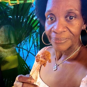 Mid City Beer Garden - Eating two shrimp I picked from the  shrimp poboy. - Beer Gardens Near Me - Baton Rouge, Louisiana