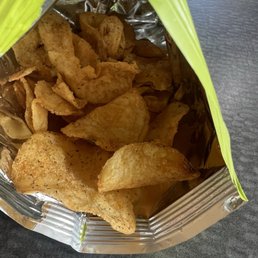 Miss Vicki's spicy dill pickle chips. They got a little heat to them. Miss Vicki's spicy dill pickle chips. They got a little heat to them.