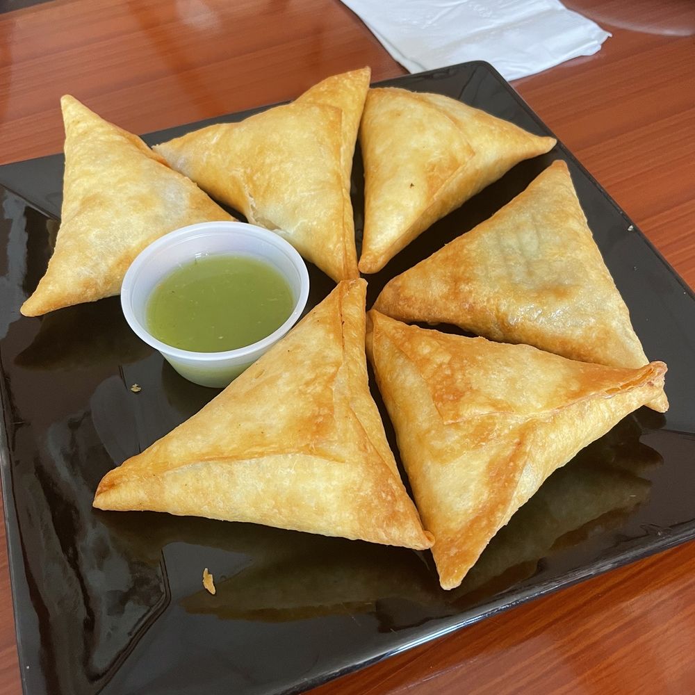Fatima's Cafe - a plate of samata with dipping sauce - African Near Me - Worcester, Massachusetts Fatima's Cafe - a plate of samata with dipping sauce - African Near Me - Worcester, Massachusetts
