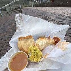 Vegetable Samosas with a mango? sauce. So good!!