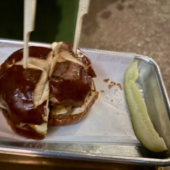 Swingers NoMad - Burger cut into 4s - Mini Golf Near Me - New York, New York
