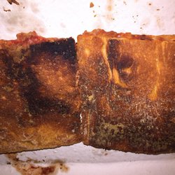 Pizza Oven - My overcooked/burnt cheese slices.