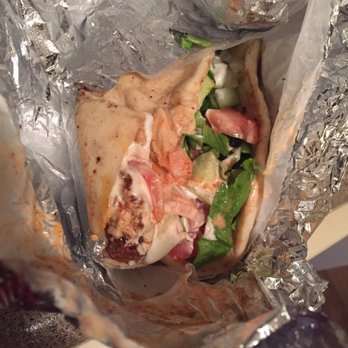 Halal Bros - Close Up -- SLOPPY BUT DELICIOUS!! Falafel Wrap To-Go - Middle Eastern Near Me - Austin, Texas Halal Bros - Close Up -- SLOPPY BUT DELICIOUS!! Falafel Wrap To-Go - Middle Eastern Near Me - Austin, Texas