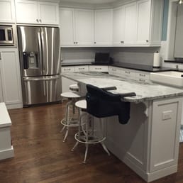 love the granite we found for our island at Renaissance warehouse.its perfect with the white cabinets and with the black absolute granite