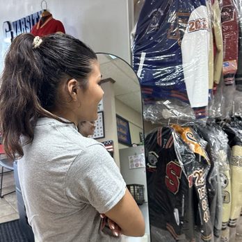 C & L Custom Varsity Jackets - looking at the different patches - Sports Wear Near Me - Cypress, California C & L Custom Varsity Jackets - looking at the different patches - Sports Wear Near Me - Cypress, California