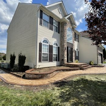 JAV Landscaping - the front of a home with a brick walkway - Landscaping Near Me - Middletown, Delaware JAV Landscaping - the front of a home with a brick walkway - Landscaping Near Me - Middletown, Delaware