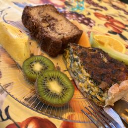 Vegetable quiche, fruit and coffee cake. Vegetable quiche, fruit and coffee cake.