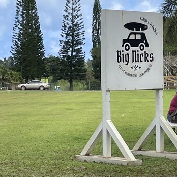 Big Nick’s - a man sitting on a bench - Burgers Near Me - Hanalei, Hawaii Big Nick’s - a man sitting on a bench - Burgers Near Me - Hanalei, Hawaii