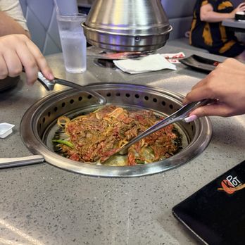 KPOT Korean BBQ & Hot Pot - Cooking beef bulgogi! - Barbeque Near Me - Hazlet, New Jersey KPOT Korean BBQ & Hot Pot - Cooking beef bulgogi! - Barbeque Near Me - Hazlet, New Jersey