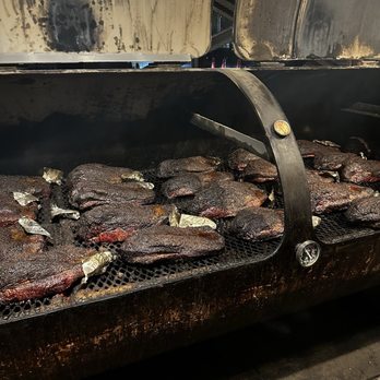 Terry Black's Barbecue - BBQ pits area - Barbeque Near Me - Austin, Texas Terry Black's Barbecue - BBQ pits area - Barbeque Near Me - Austin, Texas