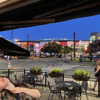 Flannery's Pub - a woman sitting at a table - Sports Bars Near Me - Cleveland, Ohio